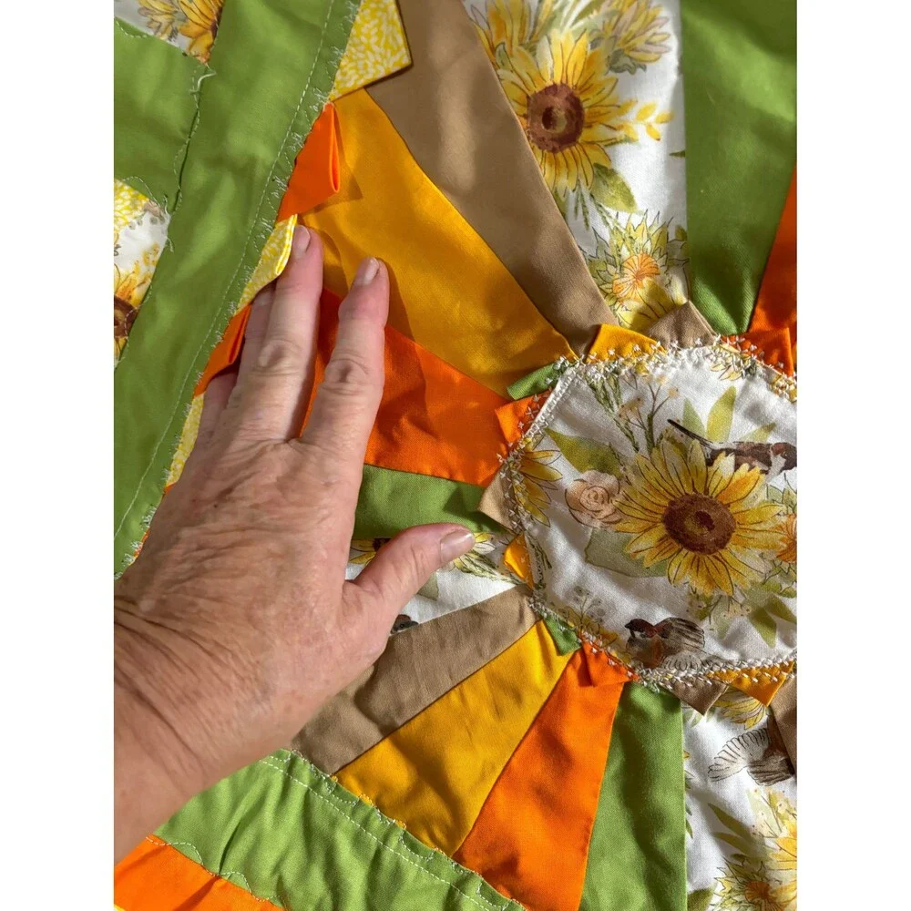 Cheerful,happy, colorful sunflower theme lap quilt or baby quilt. 41” x 40”